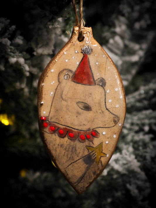 An original Christmas Holiday tree round glazed ceramic ornament handmade by Idania Salcido, the artist behind Danita Art. Glazed carved sgraffito stoneware, hand painted and decorated, it is illustrated by hand with snowmen, Christmas trees, Santa Claus, angels and snow balls and winter themes.