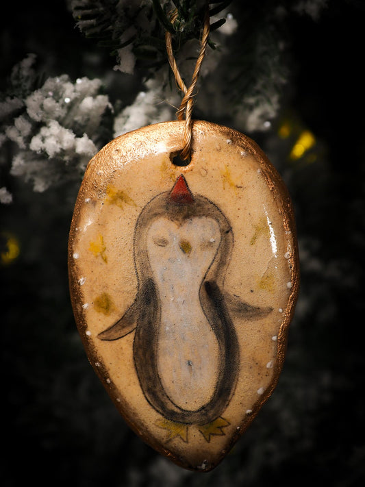 An original Christmas Holiday tree round glazed ceramic ornament handmade by Idania Salcido, the artist behind Danita Art. Glazed carved sgraffito stoneware, hand painted and decorated, it is illustrated by hand with snowmen, Christmas trees, Santa Claus, angels and snow balls and winter themes.