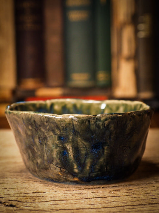 An original Christmas fire glazed ceramic handmade piece by Idania Salcido, the artist behind Danita Art. Glazed, carved sgraffito stoneware, hand painted and decorated, it is illustrated by hand with snowmen, Christmas trees, Santa Claus, angels and snow balls and winter themes.