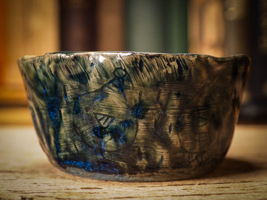 An original Christmas fire glazed ceramic handmade piece by Idania Salcido, the artist behind Danita Art. Glazed, carved sgraffito stoneware, hand painted and decorated, it is illustrated by hand with snowmen, Christmas trees, Santa Claus, angels and snow balls and winter themes.