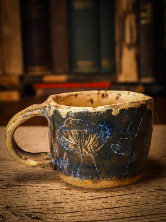 An original Christmas fire glazed ceramic handmade piece by Idania Salcido, the artist behind Danita Art. Glazed, carved sgraffito stoneware, hand painted and decorated, it is illustrated by hand with snowmen, Christmas trees, Santa Claus, angels and snow balls and winter themes.