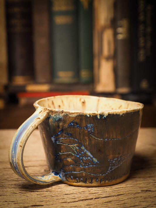 An original Christmas fire glazed ceramic handmade piece by Idania Salcido, the artist behind Danita Art. Glazed, carved sgraffito stoneware, hand painted and decorated, it is illustrated by hand with snowmen, Christmas trees, Santa Claus, angels and snow balls and winter themes.