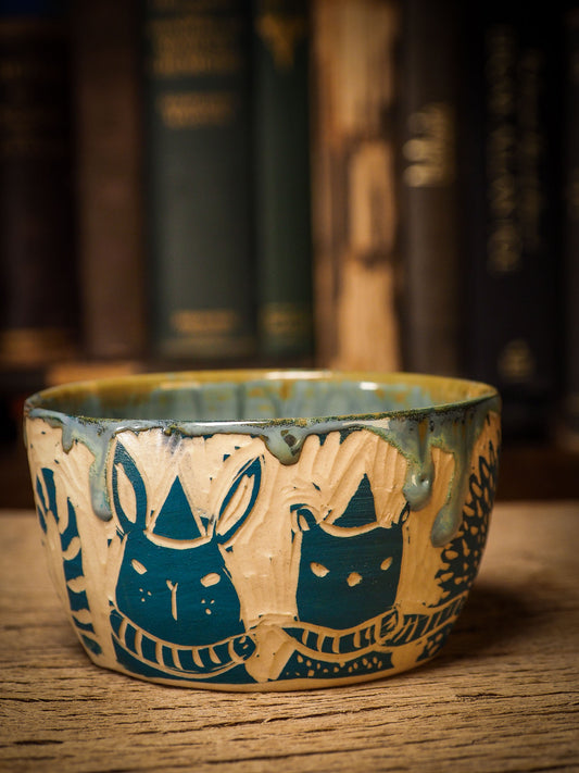 An original Christmas fire glazed ceramic handmade piece by Idania Salcido, the artist behind Danita Art. Glazed, carved sgraffito stoneware, hand painted and decorated, it is illustrated by hand with snowmen, Christmas trees, Santa Claus, angels and snow balls and winter themes.