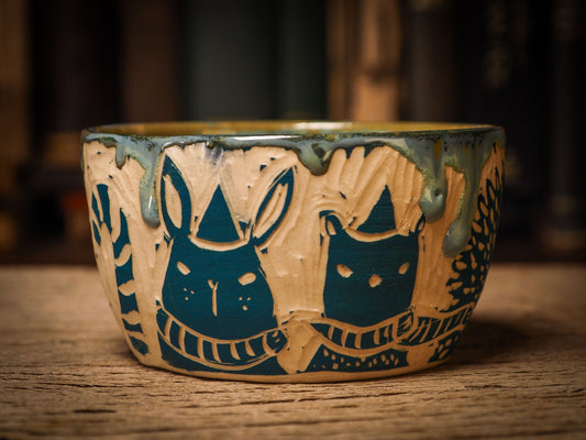 An original Christmas fire glazed ceramic handmade piece by Idania Salcido, the artist behind Danita Art. Glazed, carved sgraffito stoneware, hand painted and decorated, it is illustrated by hand with snowmen, Christmas trees, Santa Claus, angels and snow balls and winter themes.