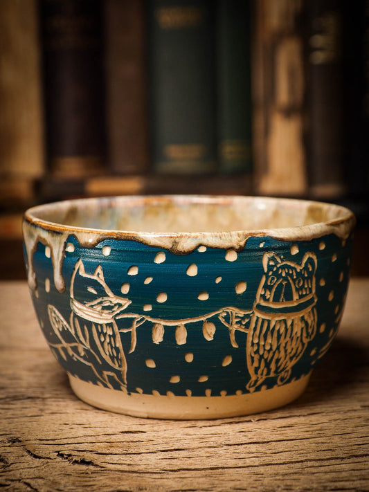 An original Christmas fire glazed ceramic handmade piece by Idania Salcido, the artist behind Danita Art. Glazed, carved sgraffito stoneware, hand painted and decorated, it is illustrated by hand with snowmen, Christmas trees, Santa Claus, angels and snow balls and winter themes.