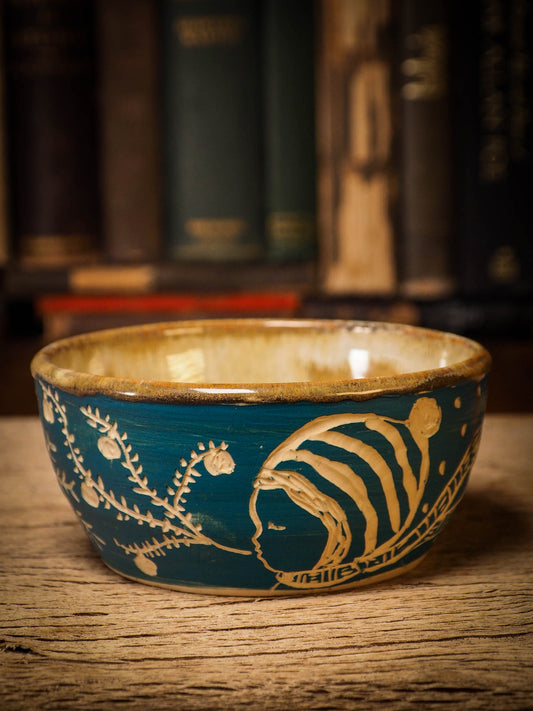 An original Christmas fire glazed ceramic handmade piece by Idania Salcido, the artist behind Danita Art. Glazed, carved sgraffito stoneware, hand painted and decorated, it is illustrated by hand with snowmen, Christmas trees, Santa Claus, angels and snow balls and winter themes.