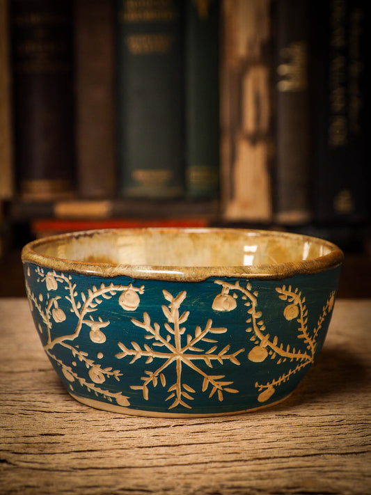 An original Christmas fire glazed ceramic handmade piece by Idania Salcido, the artist behind Danita Art. Glazed, carved sgraffito stoneware, hand painted and decorated, it is illustrated by hand with snowmen, Christmas trees, Santa Claus, angels and snow balls and winter themes.