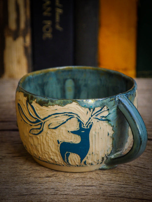 An original Christmas fire glazed ceramic handmade piece by Idania Salcido, the artist behind Danita Art. Glazed, carved sgraffito stoneware, hand painted and decorated, it is illustrated by hand with snowmen, Christmas trees, Santa Claus, angels and snow balls and winter themes.