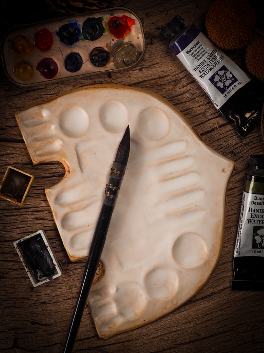 Each artist paint glazed ceramic palette by Idania Salcido, the artist behind Danita Art, is hand sculpted and fired with paint and scratch resistant glazes and with enough paint wells to keep and mix colors at ease. Acrylics, Oils and watercolors can be used, perfect for any medium! Clean with water or mineral spirits.