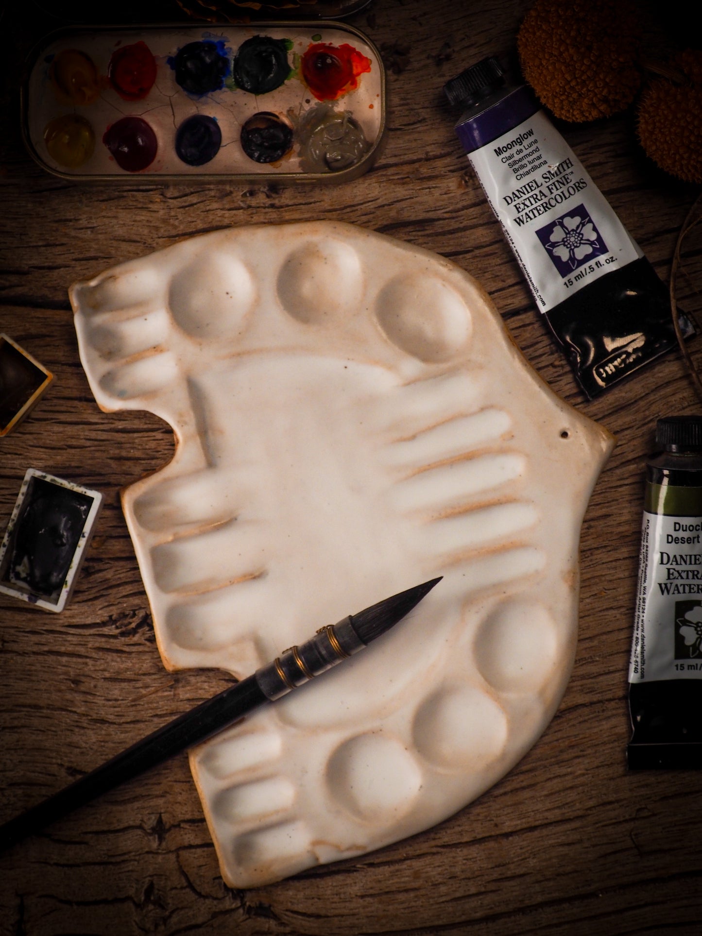 Each artist paint glazed ceramic palette by Idania Salcido, the artist behind Danita Art, is hand sculpted and fired with paint and scratch resistant glazes and with enough paint wells to keep and mix colors at ease. Acrylics, Oils and watercolors can be used, perfect for any medium! Clean with water or mineral spirits.